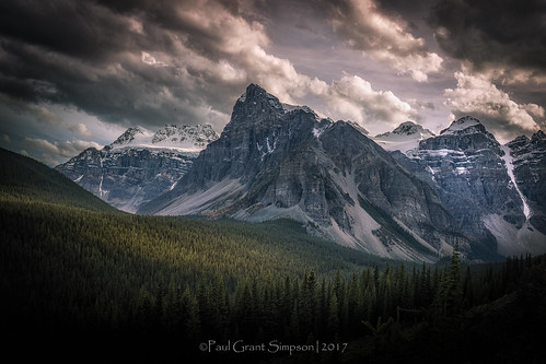 clouds canada cliffs mountains forest rocks rockymountains lakes landscape lakemoraine morainelake stormy moody