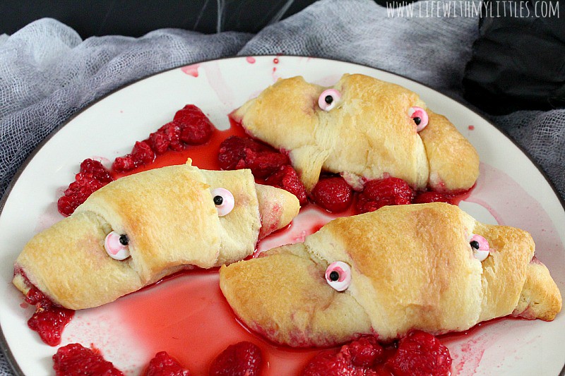 These simple raspberry monster rolls are the perfect side or dessert for your spooky Halloween dinner! And they are so easy!