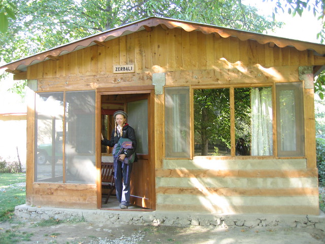 Me exiting one of the Colonel's chalets (aka the Hindu Kush Heights hotel's Mastuj branch)