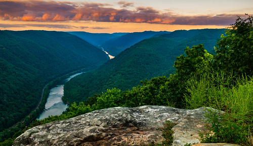 travel trees sunset sky mountains color green nature water rock horizontal stone clouds forest river landscape outdoors us high purple unitedstates nobody beaver westvirginia valley grandview overlook newriver newrivergorge