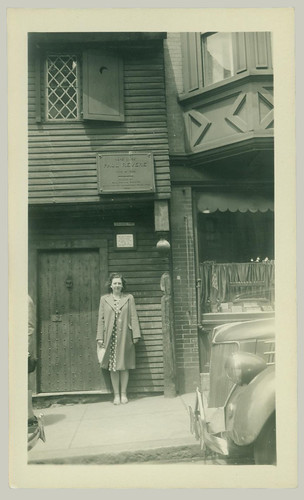 Woman in front of building