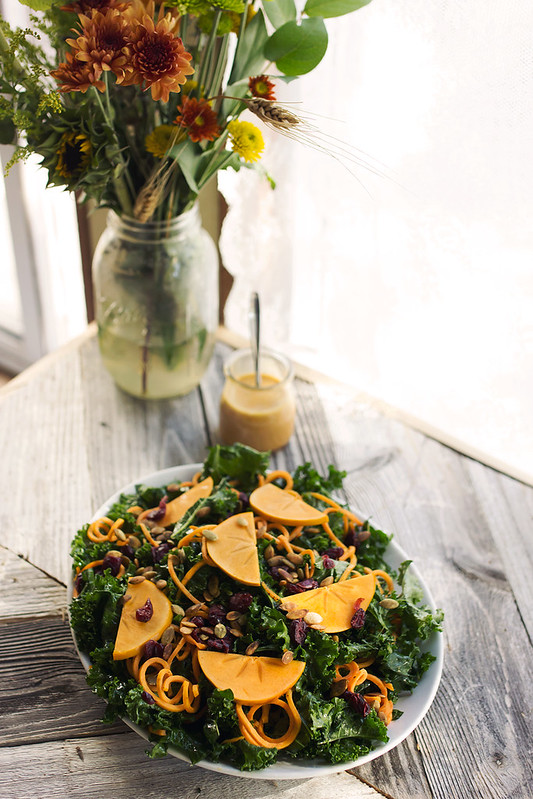 Massaged Kale Salad with Sweet Potato Noodles, Persimmon and a Smoky Orange Vinaigrette