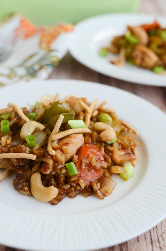 Cashew Chicken Casserole - your favorite takeout as an easy casserole! Chicken, rice, and veggies in a delicious savory sauce. And topped with crunchy chow mein noodles and cashews!