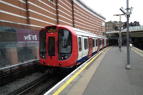 LUL Metropolitan Line S8 Stock driving coach No. 21069 departs Finchley Road at the rear of a service to Aldgate