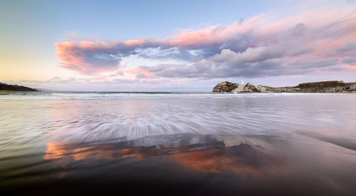 light sunset newzealand sky lighthouse water clouds sand dusk tide castlepoint wairarapa
