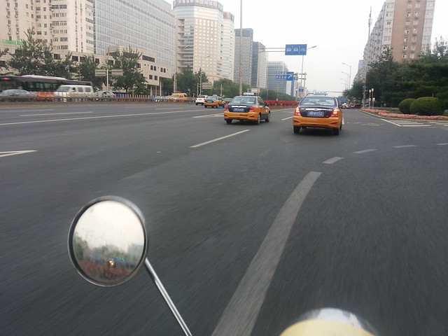 Riding Scooter in Beijing, China.
