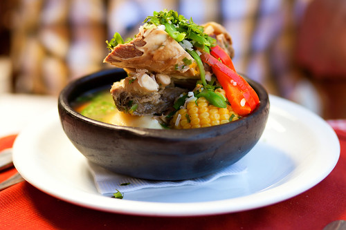 Chilean cazuela soup served in traditional clay plate