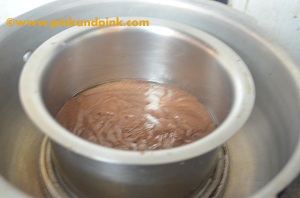 placing the cooking pan for eggless vegetarian chocolate cake recipe