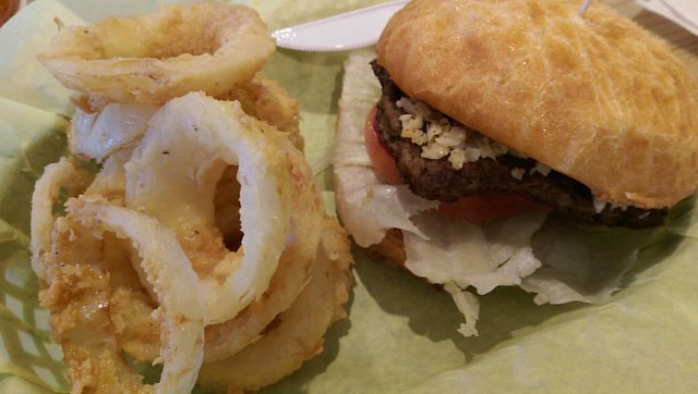 Tried a new place for dinner tonight.  Bumble bees.  My burger was "the vampire" and coated in garlic.  And Ross ordered me onion rings.  Probably sleeping on the couch tonight.  Onion rings were awesome, like tempura batter awesome.  Burger....I'd prefer