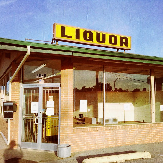 Liquor Store with Yellow Sign