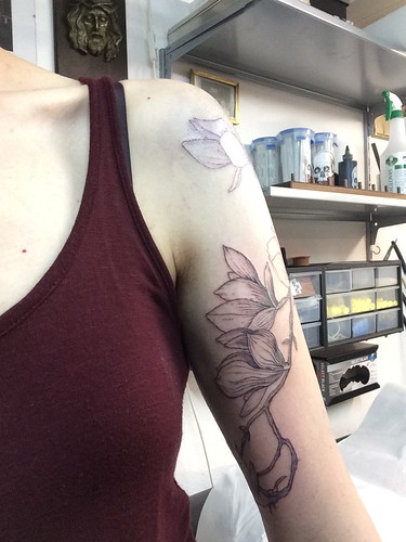 In progress floral arm tattoo by Brücius at AKA Berlin