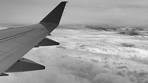 above storm clouds airplane wing iphone iphonography iphoneography