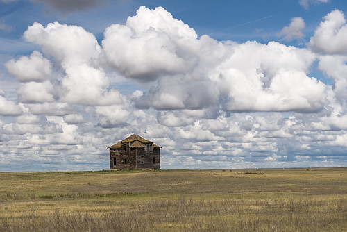 wood summer sky house canada field clouds geotagged outdoor photojournalism oldbuildings alberta cumulus midday patricia geotag architecturalphotography cumulusnimbus stilllifephotography cessford exteriorarchitecture bwcircularpolarizer nikond800 nikonafsnikkor2470mm128g