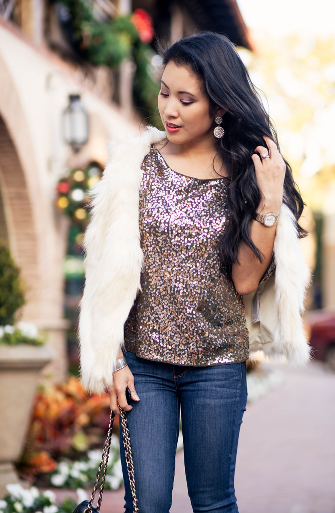 cute & little blog | petite fashion | faux fur vest, sequin top, paige verdugo jeans, black studded pumps | winter holiday party new years outfit