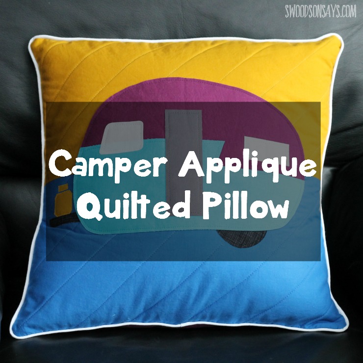 Quilted pillow with camper applique