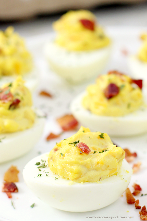 Bacon Cheddar Deviled Eggs on a plate close up.