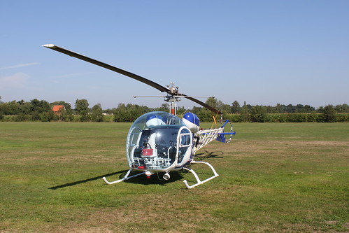 helicopter standing on grass