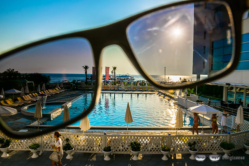 travel blue trees girls sea sky sun sunlight beach water pool sunglasses palms photography landscapes eyes creative through traveling albania glance pista durres sunbeds throughmysunglasses hotelbleart