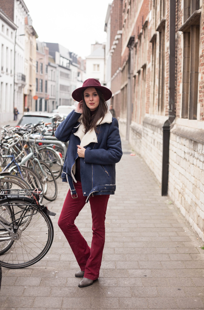 70s inspired: burgundy wide brim hat, shearling coat, burgundy flares