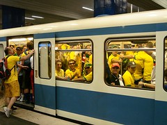 Crowded subway with brazilian fans