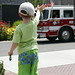 nick, waving to the fire truck in the independence day parade    MG 7558