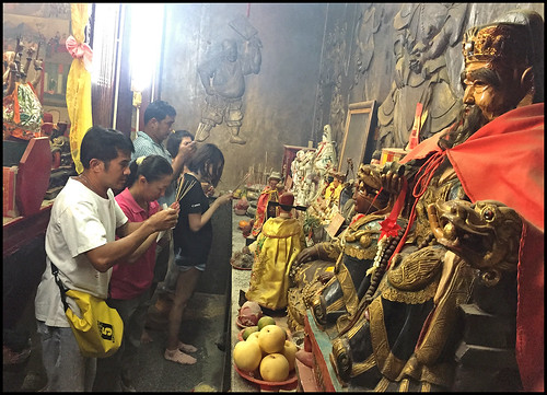 Prayers in the Por Tor Kong Shrine