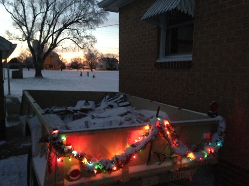 christmas lights snow demolition construction army surplus trailer sunset