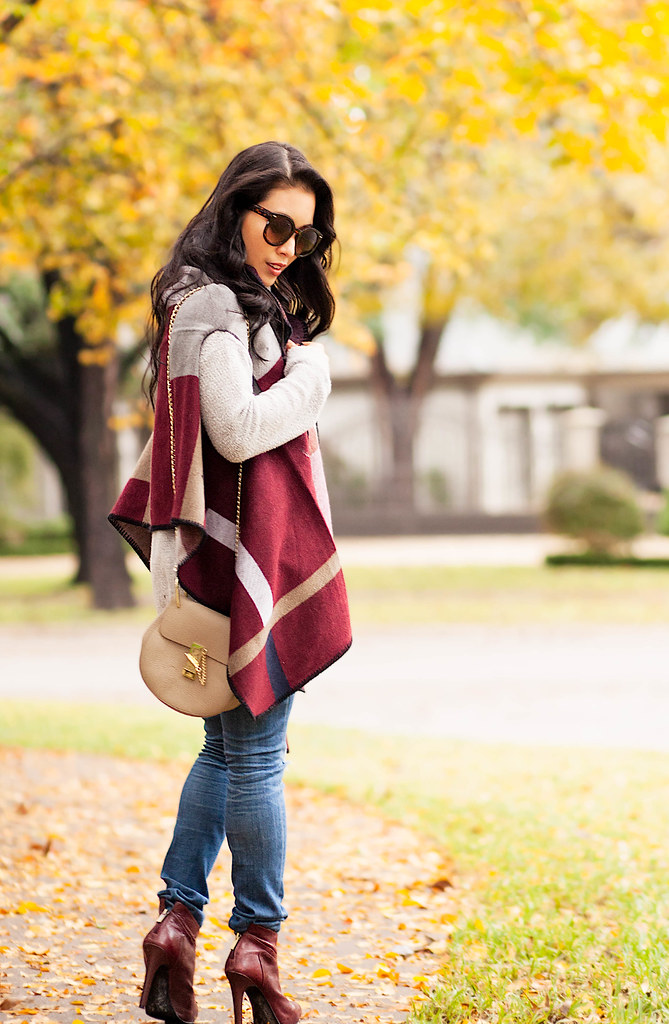 cute & little blog | petite fashion | grace color block cape, distressed jeans, burgundy ankle booties | fall winter outfit