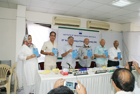 The book entitled “Qalmi Khake” by late Prof. Zafar  Nizami being released at the IOS meeting.