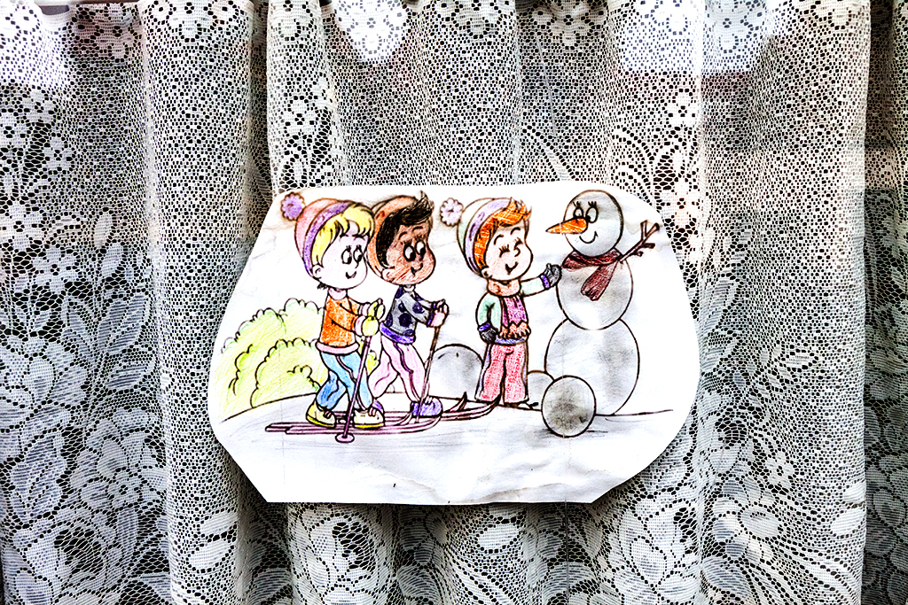 Drawing of three kids and snowman--Wurzen