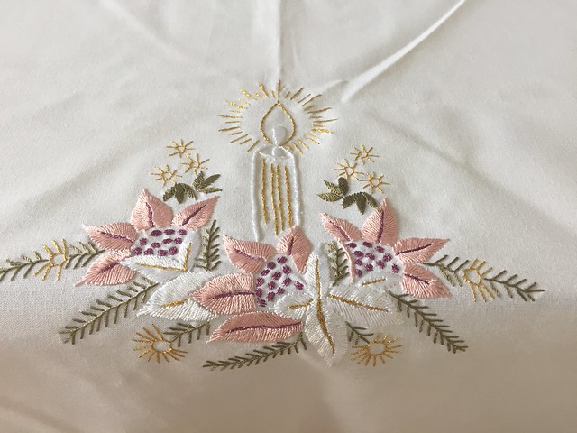 Table cloth with candle embroidery