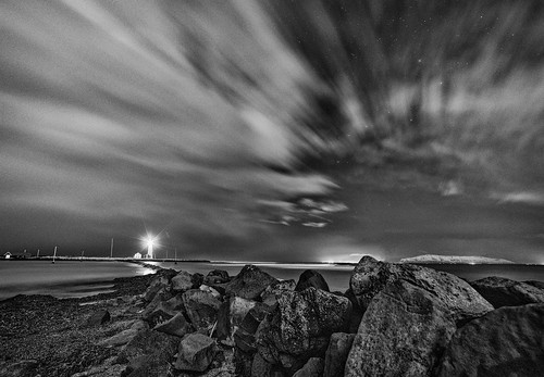 bw beach clouds commons d750 grain iceland landscape lighthouse longexposure monochrome nightshot nikon outdoor reykjavík rocks rokinon seascape shore stars travel winter