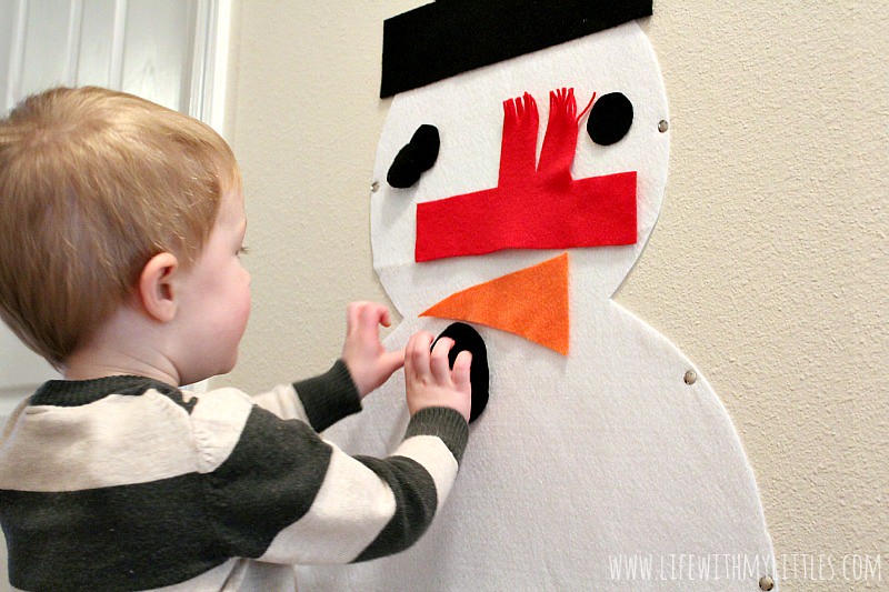 Do you want to build a snowman? This easy felt snowman is the perfect way to build a snowman inside over and over! And it couldn't be easier to make! What a fun winter craft for toddlers!