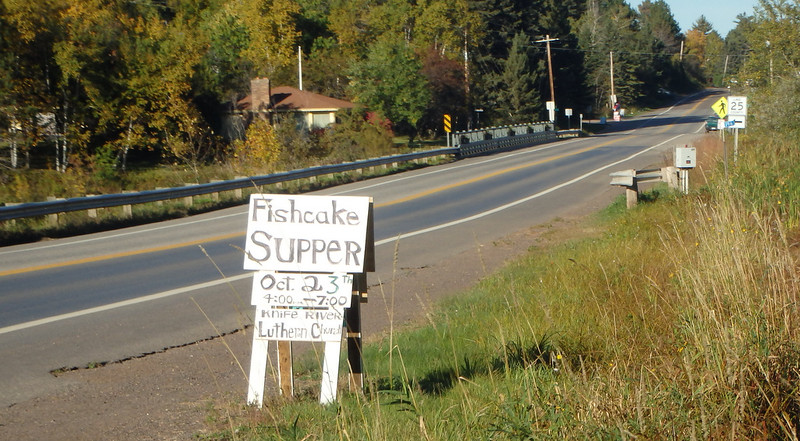 sandwich board sign along the highway