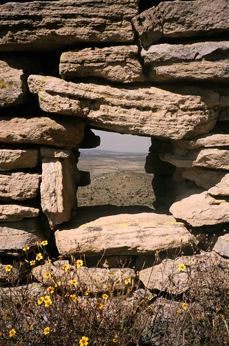 A 'window' through the ruins of La Quemada looking out over the arid land