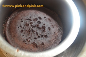 Cake is cooked for eggless vegetarian chocolate cake recipe