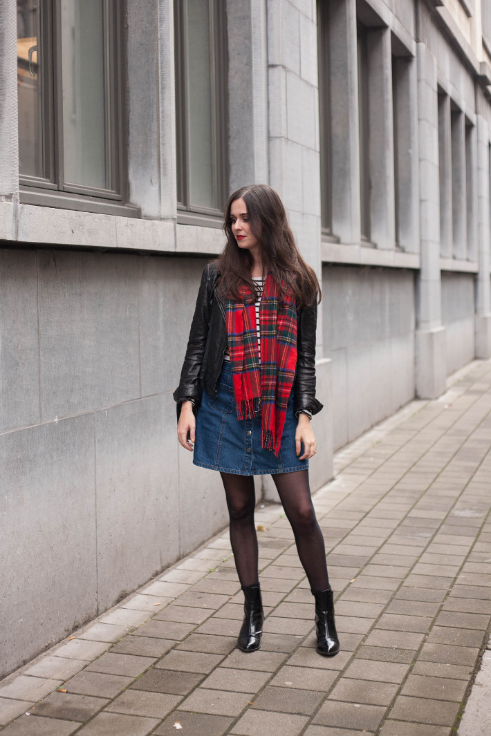 Outfit: leather jacket, plaid scarf, striped top and denim a-line skirt