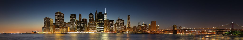 Statue of Liberty, Manhattan, Brooklyn Bridge, Empire State Building, Chrysler Building, and Manhattan Bridge panorama, blue hour