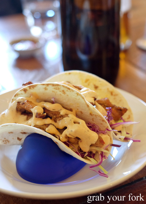 Spiced chicken and slaw soft shell tacos at The Two Wolves Community Cantina, Chippendale