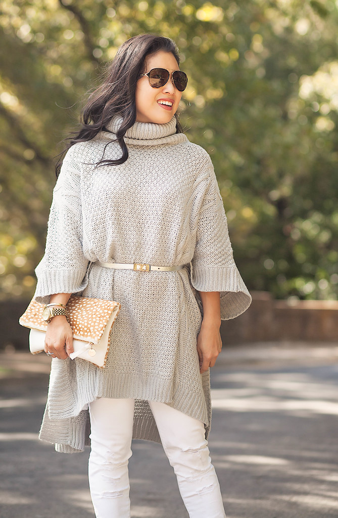 cute & little blog | petite fashion | gray knit belted poncho, white jeans, tan booties, clare v clutch | fall outfit
