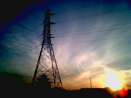 light sunset tower lines silhouette clouds dark twilight industrial electricity cirrus wisps