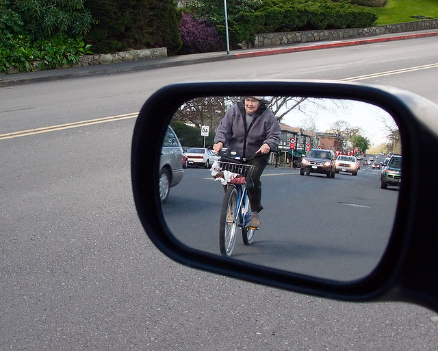 Cyclist in rear view mirror