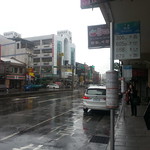 Bike back to Taipei. Stopped for bubble tea in rain.