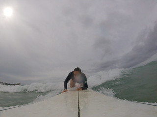 Beth surfing in Honolulu