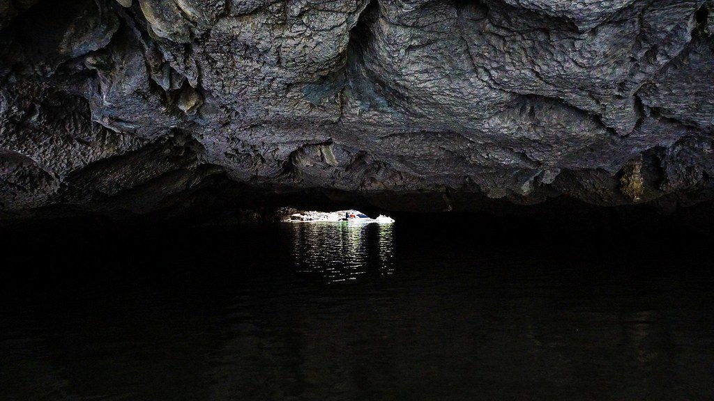 Rowing through the caves in Tam Coc, Vietnam