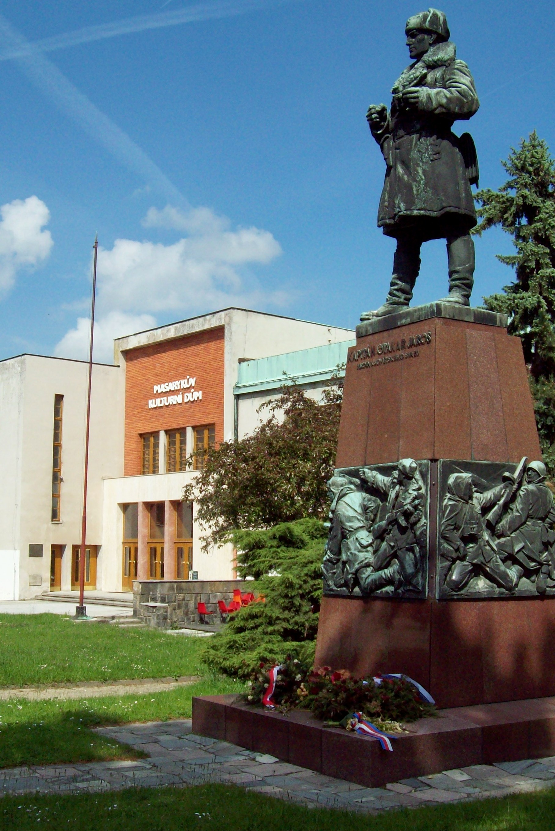 A statue of Captain Otakar Jaros stands in front of the Masaryk Cultural House in Mělník, Czech Republic. Sculpted by Oskar Kozák in 1958. Photo taken on May 23, 2010.