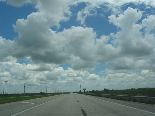 road street sky clouds