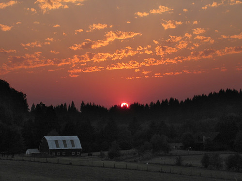sunset red barn woodland smokey wa hazy cedercreek