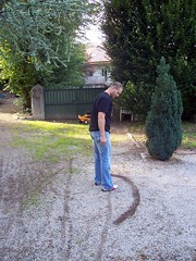 An intense game of boules (French Bocce) took place with the 2 white boys narrowly defeating the 2 Degos in extra time. - Photo of Challex