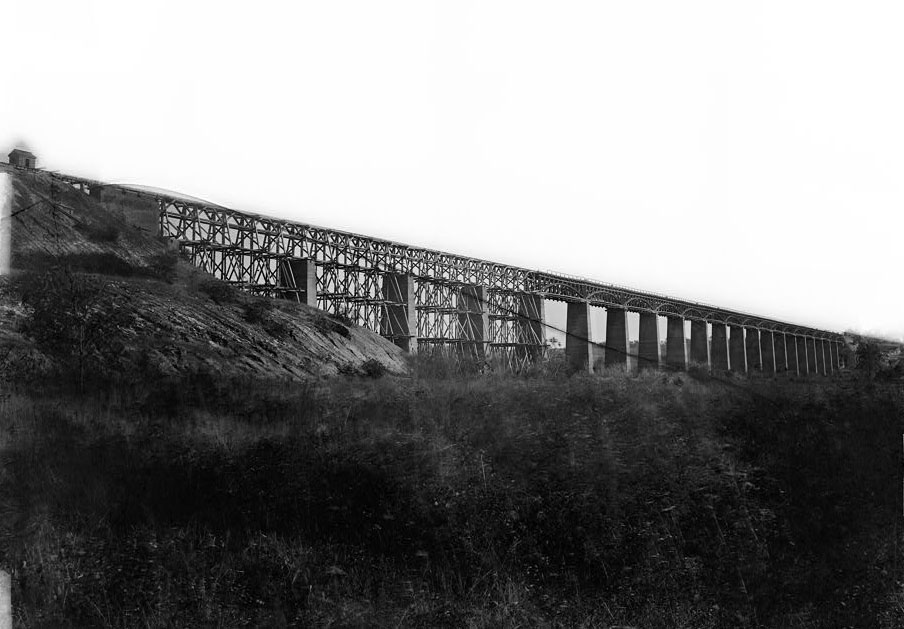 High Bridge across Appomattox River, South Side Railroad at Farmville, Virginia, photographed by Timothy H. O'Sullivan in April 1865. Forms part of Civil War glass negative collection of the Library of Congress. 